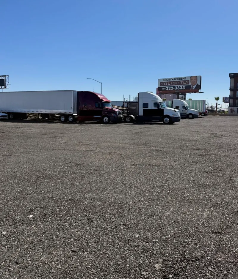 Reefer trailer and semi trucks lined up at the Strip Yard truck and trailer parking near the Las Vegas Strip